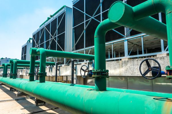 Sets of cooling towers in data center building.